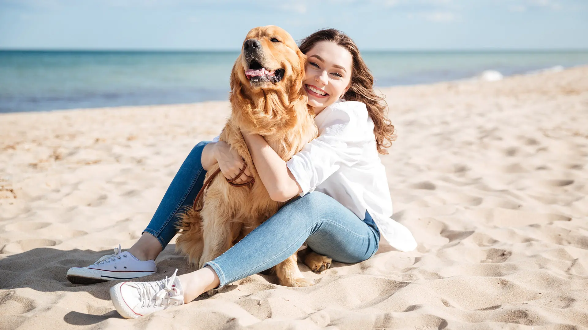 Mit Hund am Strand